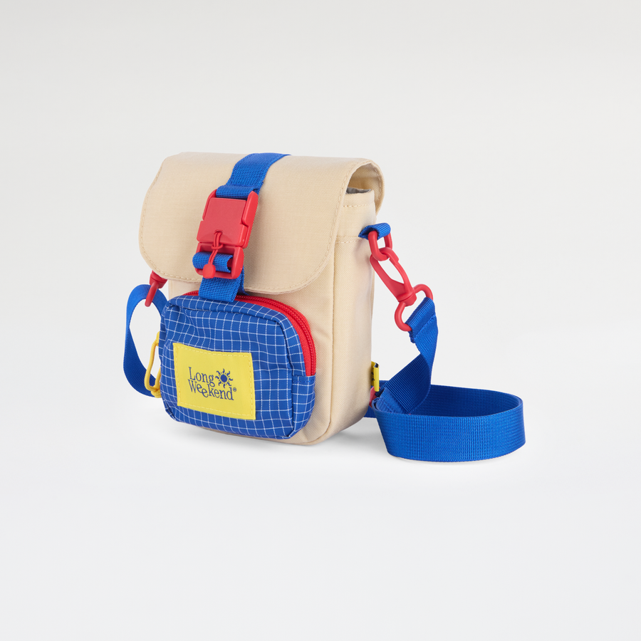 Long Weekend Crossbody Bag in Cream, three-quarter with strap