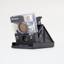 Polaroid SLR 680 Clear Housing, front three-quarter